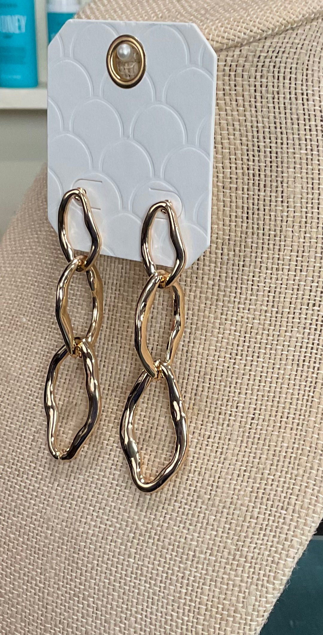 textured oval long earrings