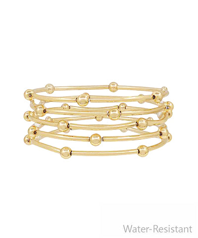 Layered gold bracelet stack