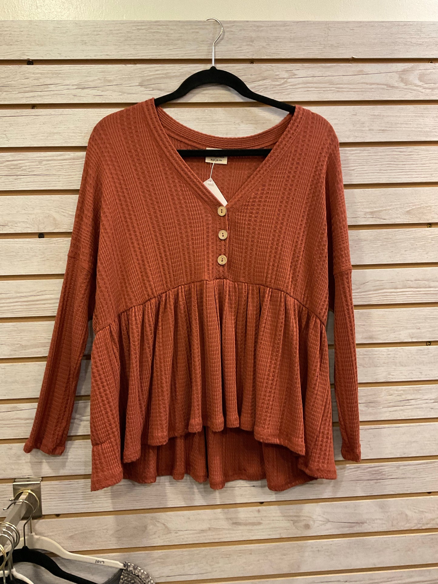 Rust peplum top