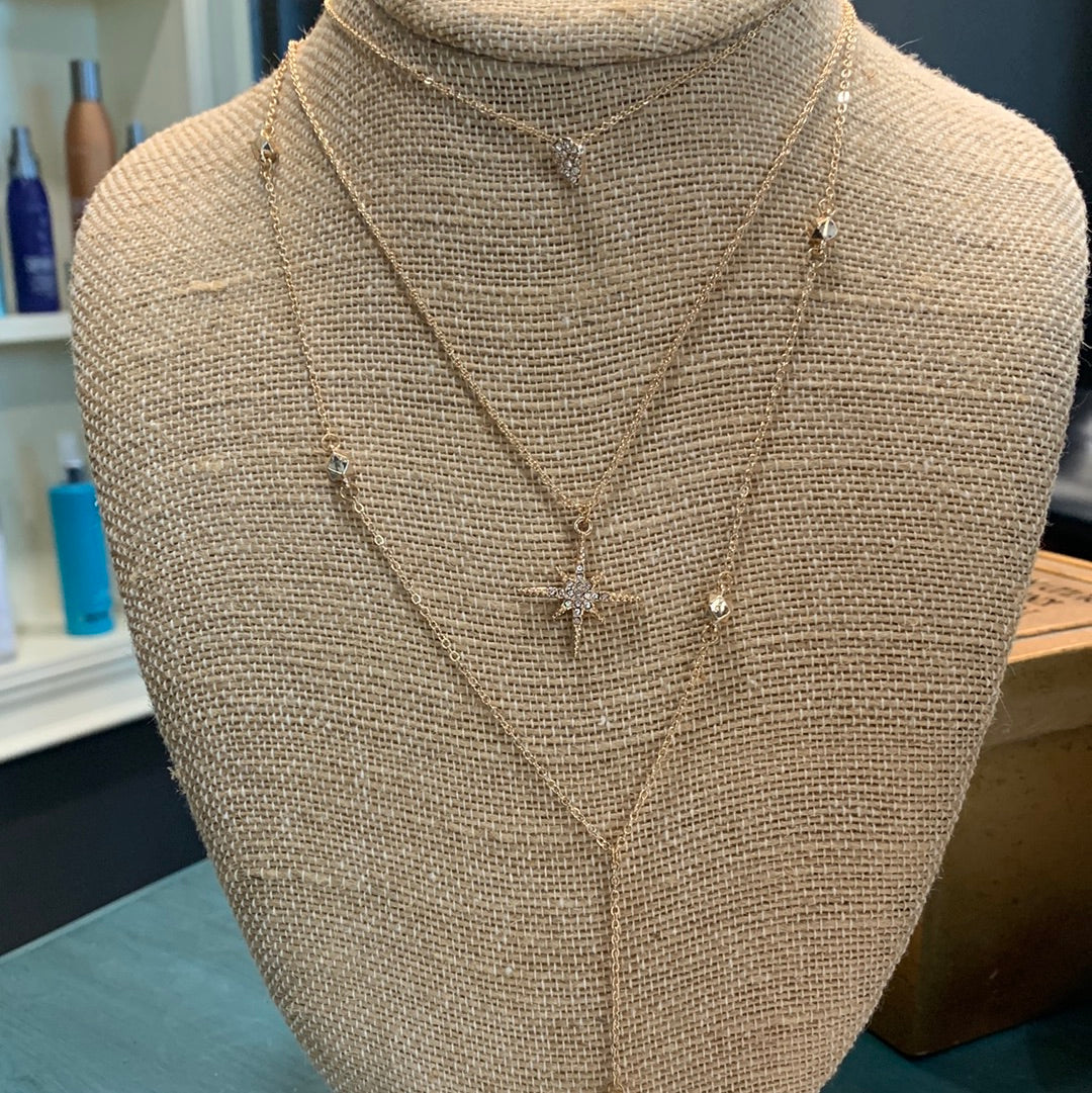 Gold north star necklace